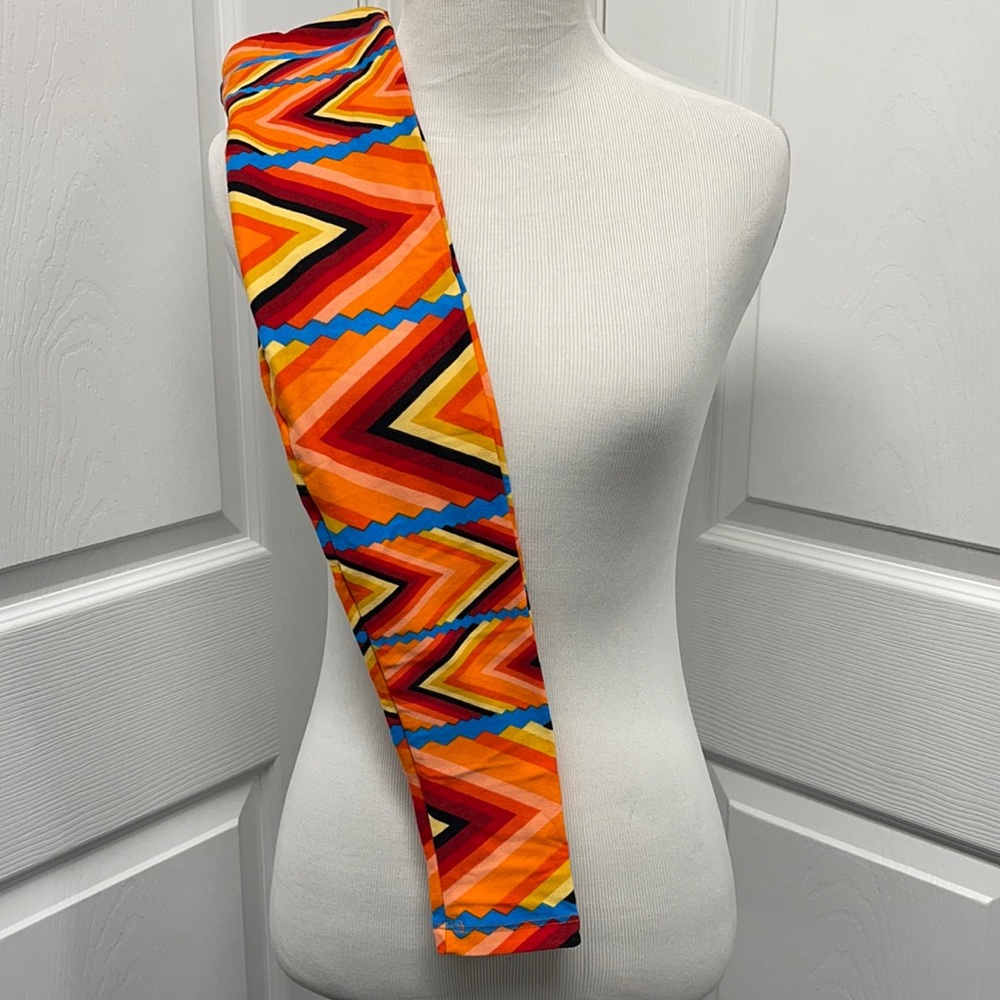 LuLaRoe New Kid’s S/M Orange Geometric Leggings NWT